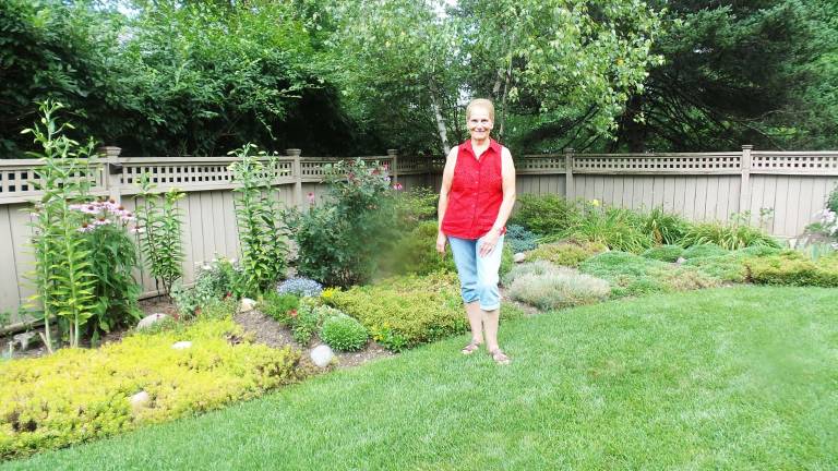 Milford's gardens, revealed Stella Provenzano in her garden at 505 Fifth Street