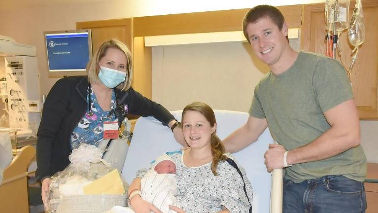 Meet the first baby born in 2021 at Wayne Memorial Pictured are Harmony Beattie, RN, Kayla Schariest with Carter, and Steven Schariest (Photo provided)