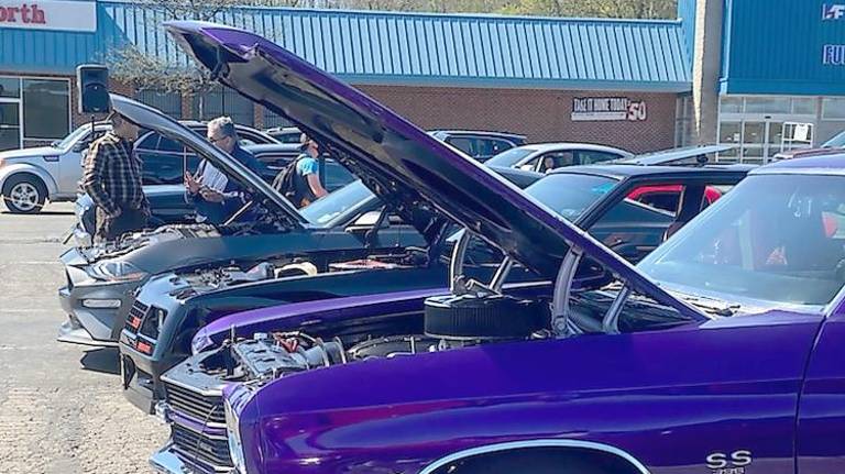 Classic cars, and the people who love them, flock to first cruise Some of the cars crusin' on Saturday (Photo by Laurie Gordon)