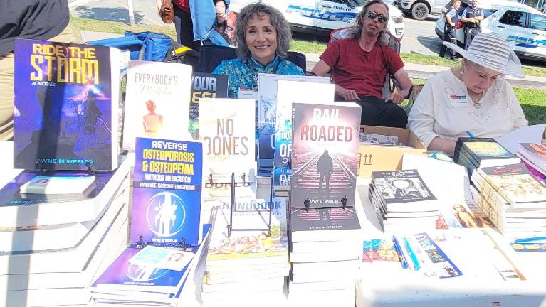 Regional authors sign their books at a past Milford Readers &amp; Writers Festival. Provided photos.