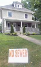 A no sewer sign in Milford (Photo by Frances Ruth Harris)