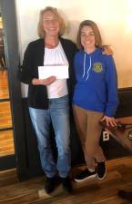 Marie Farrell, Lions Club member and Jamie Dykstra, Rotary President