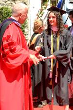 Ava Nienstadt receiving her degree from Dickinson College.