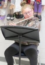 Mackenzie Heath plays flute on morning show