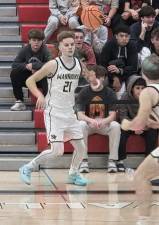 Delaware Valley High School senior guard Tyler Lombardo passes the ball in a game at home against Pike County rival Wallenpaupack on Jan. 9.