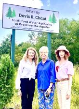 Pictured from left in front of the newly erected sign acknowledging the property donation are Tamara Chant, Judy Chant and Holley Chant.