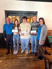 L to R: John Messer, Rotarian, Julia VanJahnke, first-place winner, Jason Helferty, second-place winner and Nat Carso, third-place winner, Jamie Dykstra, President.