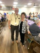 A previous Elder Justice Day. Pictured is Commissioner Matthew Osterberg and Lana Romeo, activity/program director at the Area Agency on Aging.