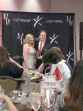 Tim Sohn, recipient of the Mission Award from the Leukemia &amp; Lymphoma Society, stands with Jana Boyer, executive director at the Leukemia &amp; Lymphoma Society.