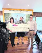 From left:<b> </b>Shelly McAllister, NBT Bank Assistant Vice President; Matt Colgan, NBT Bank Regional Commercial Banking Manager; and Craig Lukatch, Lacawac Sanctuary Foundation President.