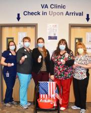 Honesdale VA Outpatient Clinic staff (l-r) Tracy Robinson, Jolene Pryzant, Jessica Woodmansee, Rheanon Weston, and Tina Taylor with Moment of Remembrance Campaign buttons.