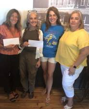 From left: JoAnn Donnely, Executive Director of CDD, Eva Warner, Executive Director of GAIT, Jamie Dykstra, Rotary President, and Denise Fretta, CDD.