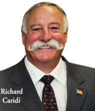 Richard A. Caridi.