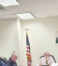 Solicitor John H Klemeyer, left, and Supervisor Chair Thomas E Mincer