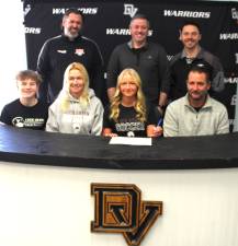 <b>P</b>ictured (left to right: front row) – Leif-Erik (brother), Mrs. Veronika Orby, senior Krystina Orby and Mr. Frank Orby. (back row) – Eastern Pike soccer coach Derek Eversdyke, assistant coach Jeff Luhrs and head coach Kevin Quinn.