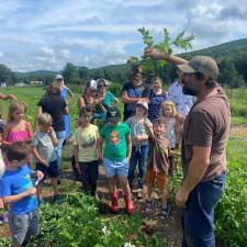 A farm tour led by Greg Swartz.
