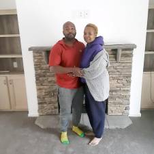 Ray and Naeemah Polhill in their new home. (Photo by Naeemah Polhill)