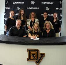 Pictured (left to right: front row): Scott Willson, senior Victoria Willson and Laura Willson; (left to right: next row): Assistant swimming/diving coach Rachel Phipps, sister Jessica Willson, guidance counselor Jessica Favorito, head swimming/diving coach Chelsea Shatt and assistant swimming/diving coach Grace Riexinger. Photo provided by Leslie Lordi/Delaware Valley High School.