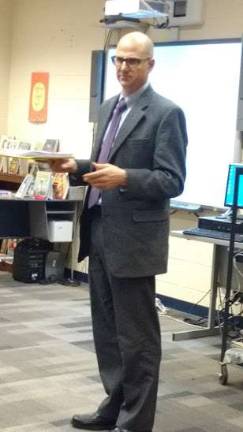 Don Flynn of BDA Architects updates the school board on the next four years of construction at DV (Photo by Anya Tikka)