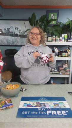 Christina Kotar at her store, Milford Pet Foods and Supply (Photo by Frances Ruth Harris)
