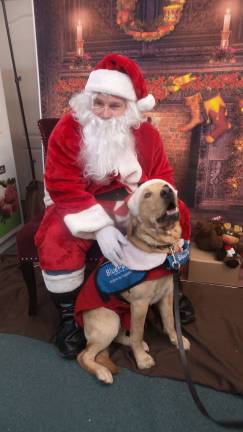Benni with Santa Paws (Photo by Frances Ruth Harris)