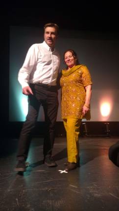 Festival director Will Voelkel with a volunteer in traditional Nepalese dress (Photo by Anya Tikka)