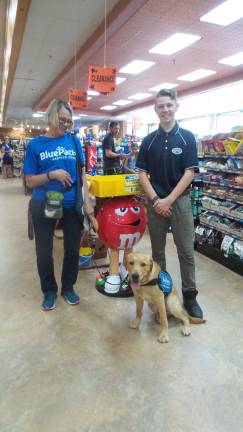 Benni with the M&amp;Ms man, Chrisanne Cubby, and Key Food Market stocker Dylan Domke (Photo by Frances Ruth Harris)