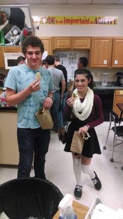 Pictured are Jacob Ahlstrand and Serena Heagney with Christmas cookies made with the cookie cutters they created (Photo provided)