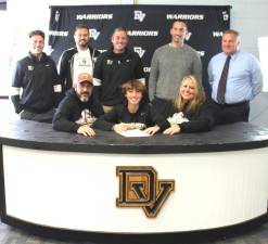 L-R Front: Stefan Ciardullo, senior Giavanna Ciardullo, and Briana Ciardullo. L-R Back: Head soccer coach Kevin Quinn, assistant coach Andy Rupp, assistant coach Jeff Luhrs, and former soccer coaches Brian Sweeney and Jeff Rainear.