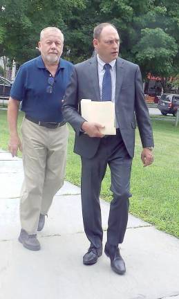 Barry Heim and his attorney, Matthew Galasso, walk toward the Pike County Courthouse (Photo by Frances Ruth Harris)