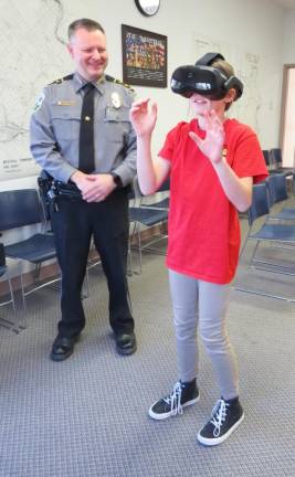 Getting the scoop: Young reporters chat with local police