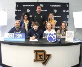 William Brower, senior Jake Brower with his parents, William and Kelly Brower, his sister Laurel Brower (r) High school principal Dr. Nicole Cosentino, head basketball coach Kris Holtzer and guidance counselor Crystal Ross.