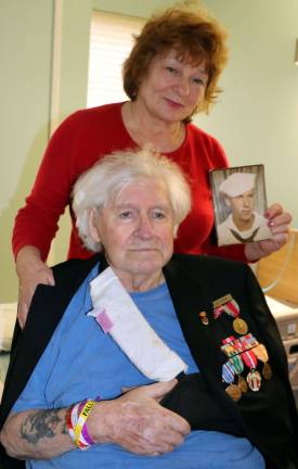 Charles Strom, 92, a battleship gunner during the D-Day invasion of Normandy, with his wife, Svyatoslava (Photo provided)