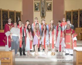 The Mass and Celebration of the Sacrament of Confirmation included: