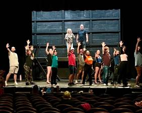 The cast of “All Shook Up” rehearses for upcoming performances at the Milford Theater.