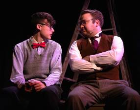 George Gibbs played by Logan Woodward) and Dr. Frank Gibbs (played by Kelly Krieger) have a father/son chat in “Our Town” at the Milford Theater.