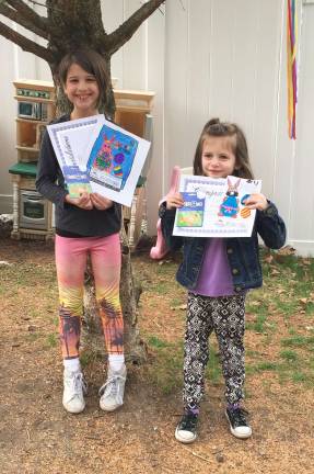 Lyla and Ani win Easter coloring contest