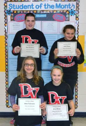 Pictured: (standing) Evan Roccabruna, grade 7 and Emily Ocasio, grade 7. (kneeling) Bobbi Vonderheide, grade 8 and Riley Brown, grade 6.