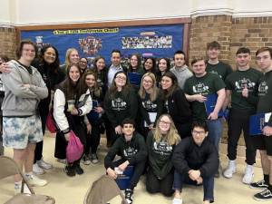 Delaware Valley High School newspaper staff and adviser with speaker at the Sam Goodwin Tom Bigler Journalism conference.