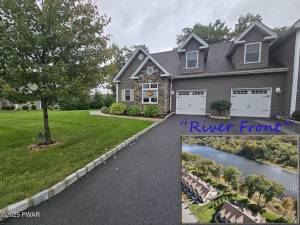 Enjoy river views and luxury living in this upscale townhome