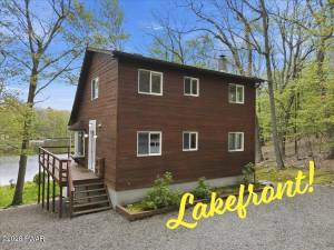 Lakefront home brings the outdoors in with spectacular views