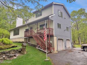 Contemporary chalet comes with beach, pool access