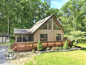 Updated three-bedroom chalet has character and flexible living space