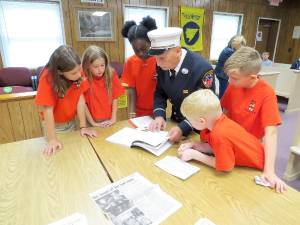 L-R: Emily Giblin, Kendall Eckert, Sekai Jones, Lieutenant Joseph Rennish, Patrick Tamplin,