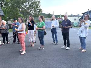 Candelight Vigil in front of DVA offices at back of line are Sean Strub (white shirt) and Jay Blotcher (blue shirt).