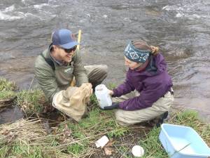Watershed specialist Rachel Posavetz collecting macroinvertebrates with Nick Spinelli of the Lake Wallenpaupack Watershed Management District on World Water Monitoring Day in September.