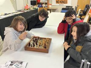 Young enthusiasts enjoy a game at Milford’s new kid’s chess club.