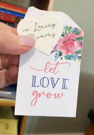 A “Let Love Grow” packet received by guests.