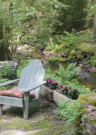 You’ll find this nature lover’s private paradise by a babbling brook