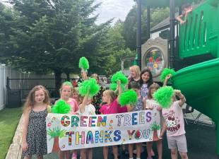 Students from the Green Trees Learning Center thank the Rotary Club for their assistance.